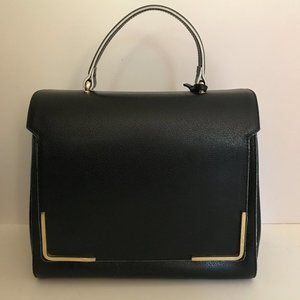 Innue Black Handbag with Gold-tone Hardware